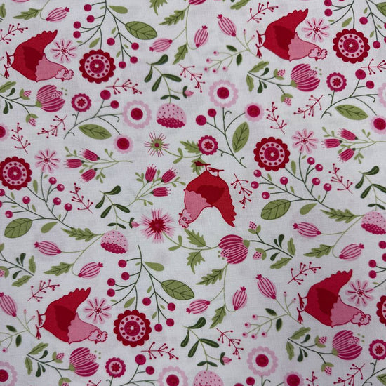 Smitten Chicken Hen House Floral quilting cotton fabric by Poppie Cotton featuring pink and red hens surrounded by flowers, berries, and green foliage on a white background.