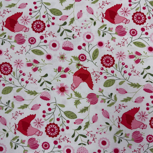 Smitten Chicken Hen House Floral quilting cotton fabric by Poppie Cotton featuring pink and red hens surrounded by flowers, berries, and green foliage on a white background.