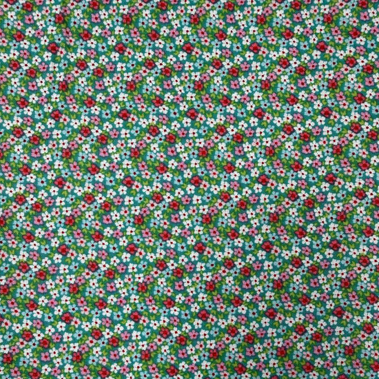 Smitten Chicken Flower Patch quilting cotton fabric by Poppie Cotton featuring tiny red, pink, and white flowers with green foliage scattered across a soft aqua background.