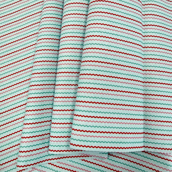 Smitten Chicken Ric Rac quilting cotton fabric by Poppie Cotton featuring fine wavy horizontal stripes in aqua, pink, and red on a white background.