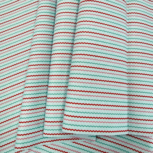 Smitten Chicken Ric Rac quilting cotton fabric by Poppie Cotton featuring fine wavy horizontal stripes in aqua, pink, and red on a white background.