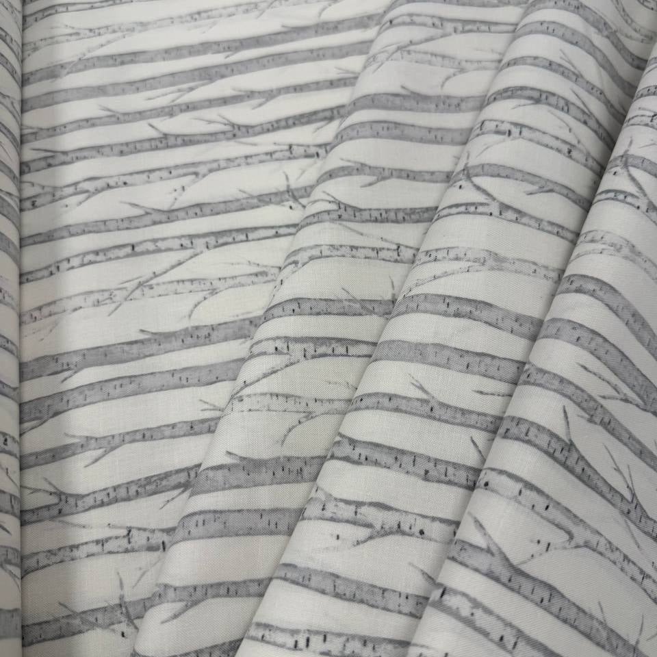 Tanglewood White Multi 100% cotton fabric featuring layered grey tree branches on a white background, product code 29286-10