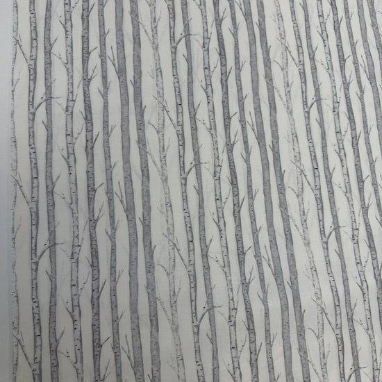 Tanglewood White Multi 100% cotton fabric featuring layered grey tree branches on a white background, product code 29286-10