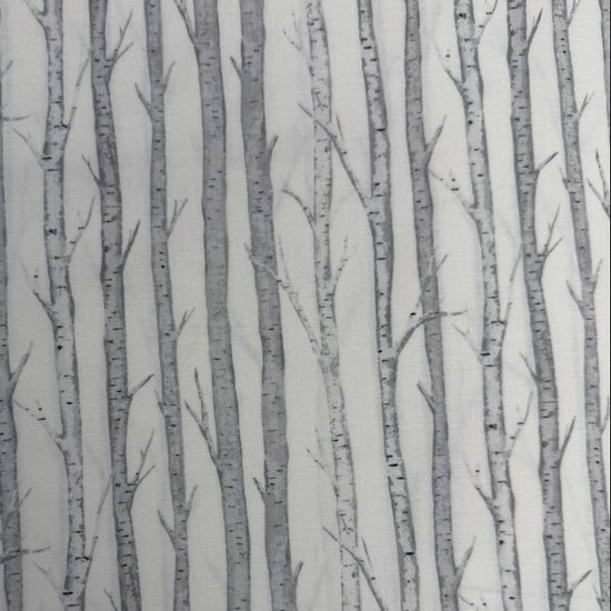 Tanglewood White Multi 100% cotton fabric featuring layered grey tree branches on a white background, product code 29286-10