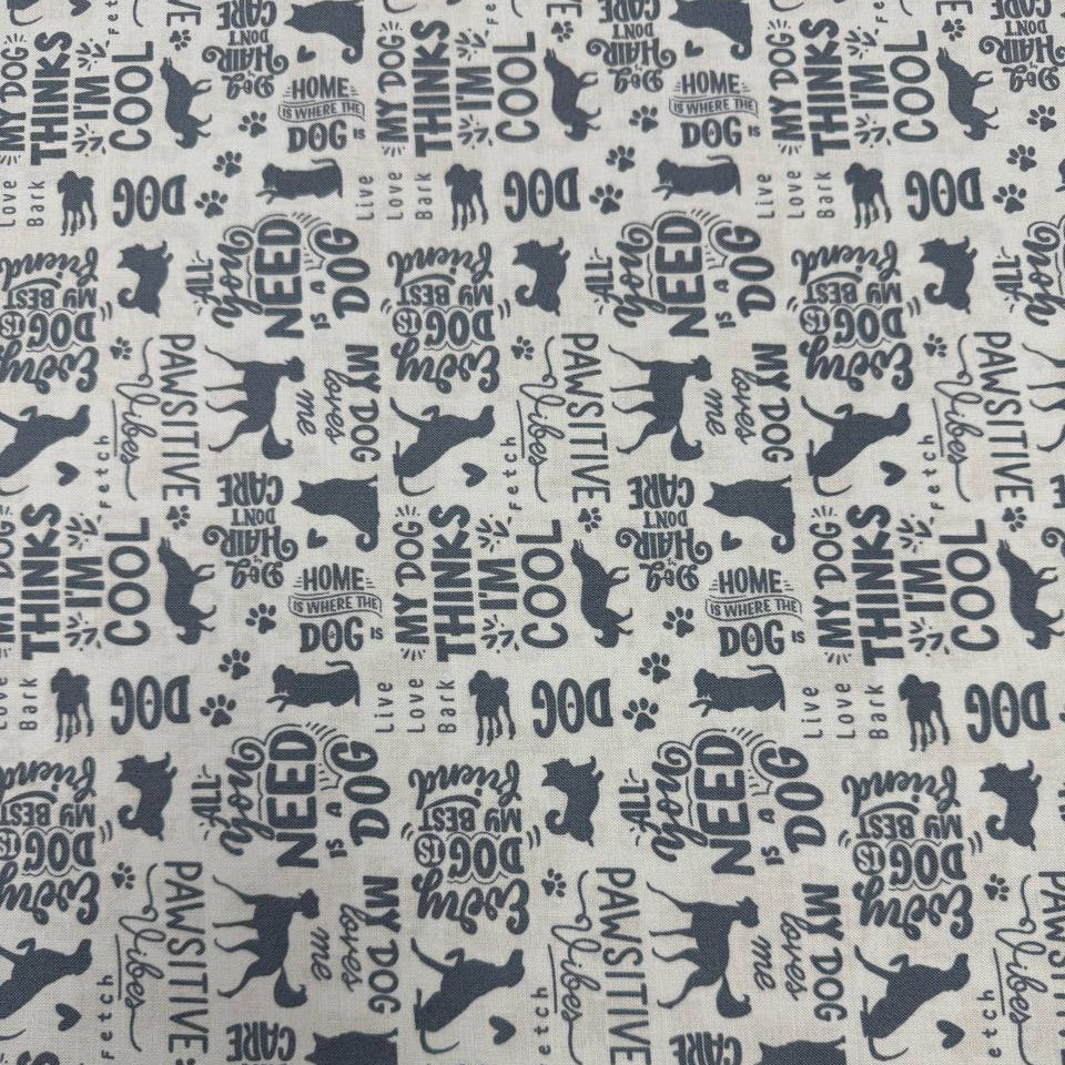 Always By My Side Blue 100% cotton fabric featuring dog silhouettes, paw prints and playful dog-themed phrases on a light background, product code 91328-40.
