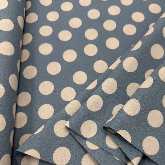 Always By My Side Blue 100% cotton fabric featuring large cream polka dots on a muted blue background, product code 91330-41.