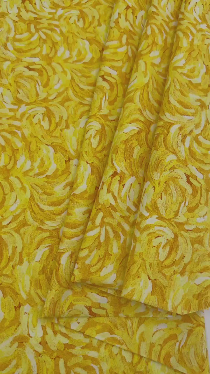 Northcott Starry Night Yellow 29264-52 100% cotton fabric featuring vibrant golden yellow, sunshine yellow and cream artistic brushstroke patterns.