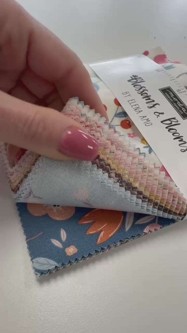 Blossoms & Blooms Charm Pack by Elena Amo for Moda Fabrics with colorful floral quilting cotton prints