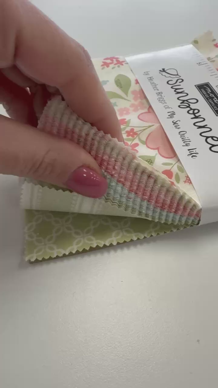 Sunbonnet Charm Pack by Heather Briggs My Sew Quilty Life for Moda Fabrics with pastel floral quilting cotton prints