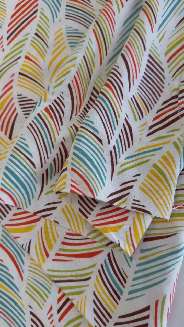 Palm print fabric in green multi tones on linen rayon blend
