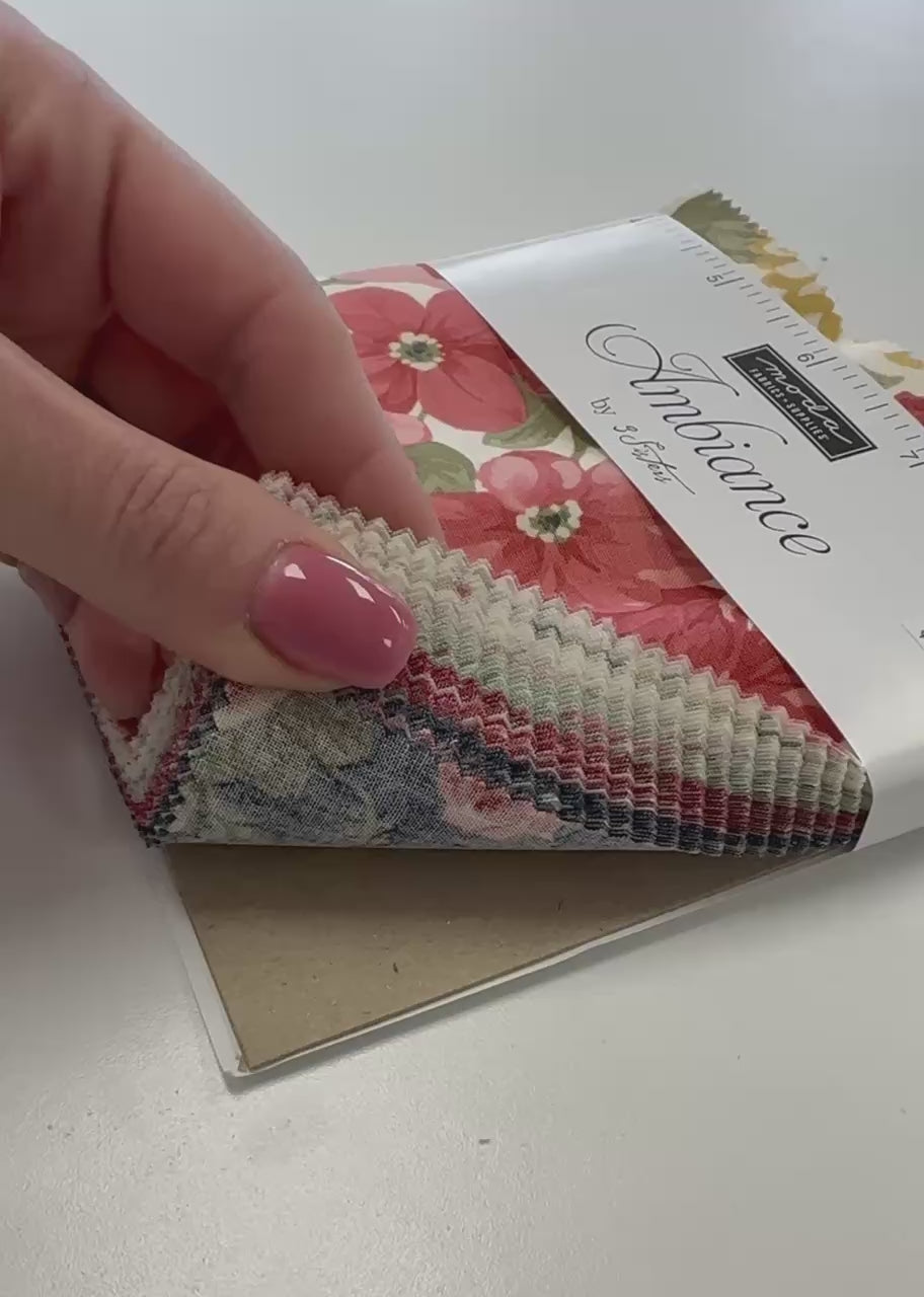 Ambiance Charm Pack by 3 Sisters for Moda Fabrics with red floral quilting cotton prints