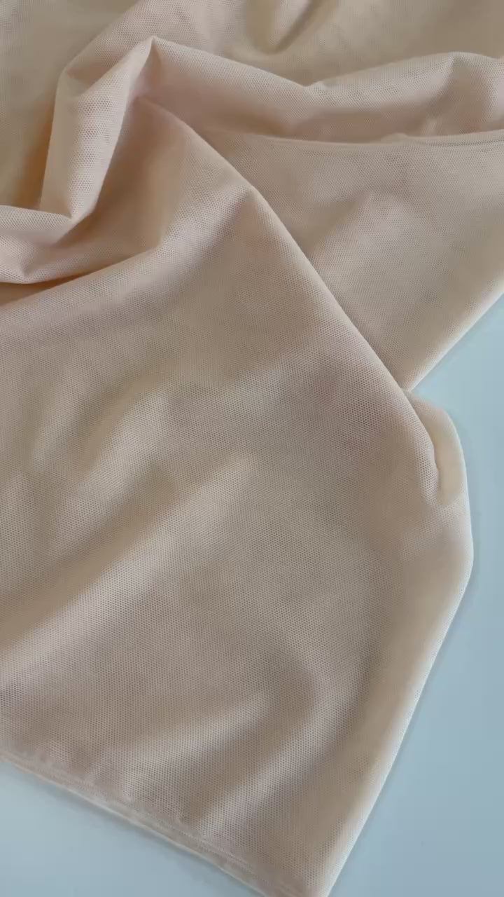 Stretch mesh fabric made from 80% nylon and 20% spandex, available in six beautiful colors and sold in 0.5 metre increments.