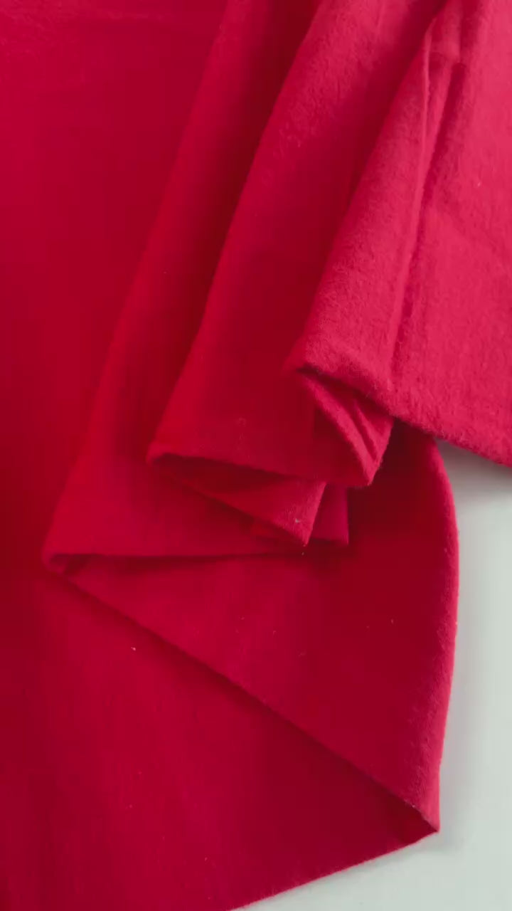 Flannel Snuggle MK Solid Red flannel fabric, 100% cotton, soft solid red flannel for quilting, blankets, pajamas, and sewing projects.