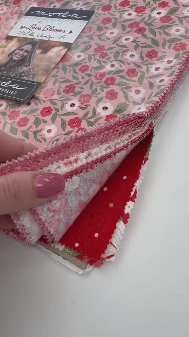 Love Blooms Layer Cake fabric bundle by Lella Boutique for Moda Fabrics with pink floral quilting cotton 10 inch squares